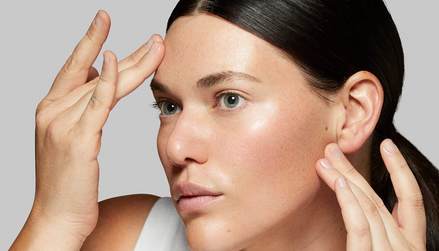 girl applying toner