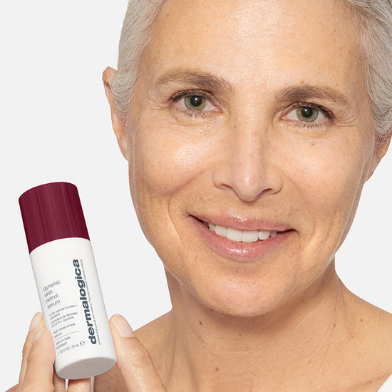 Woman holds dynamic skin retinol serum